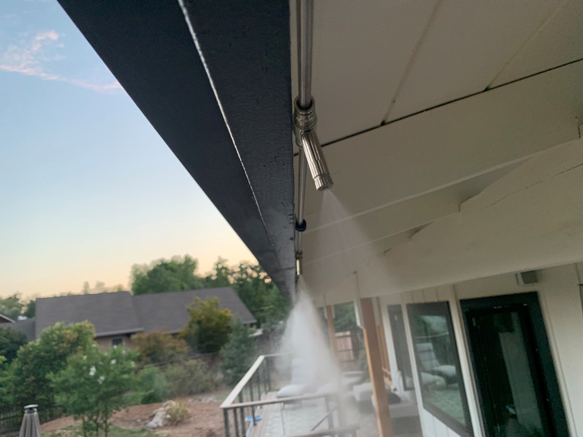 how to cool outdoor patio- install misting system 